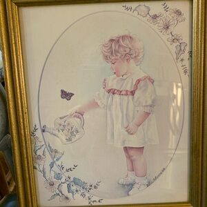 2  vintage 8x10” framed prints with gold frames. Soft pastels.